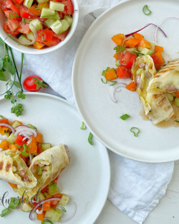 Raclette Suisse Rösti Rolls mit Cervelat und Kartoffeln